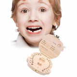 Houten doos voor melktanden met vakken ter herinnering aan de tandwisseling