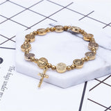 Gouden en zilveren Christelijk kruisarmband – Solana