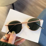 Vintage Ronde Zonnebril voor Dames – Retro Design met Metaal en Kunststof voor Elke Gelegenheid