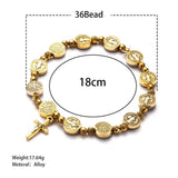 Gouden en zilveren Christelijk kruisarmband – Solana