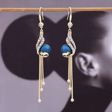 PlumeElegance | Verhoog je stijl met prachtige pauwenoorbellen!