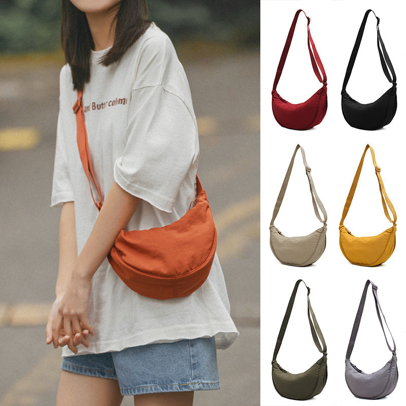 – Organiseren en stijlvol dragen met deze Half Moon Crossbody Tas