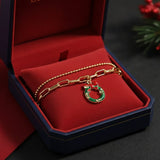 JINGLITE – Verstelbare, vergulde, feestelijke charms-armband voor de kerstsfeer